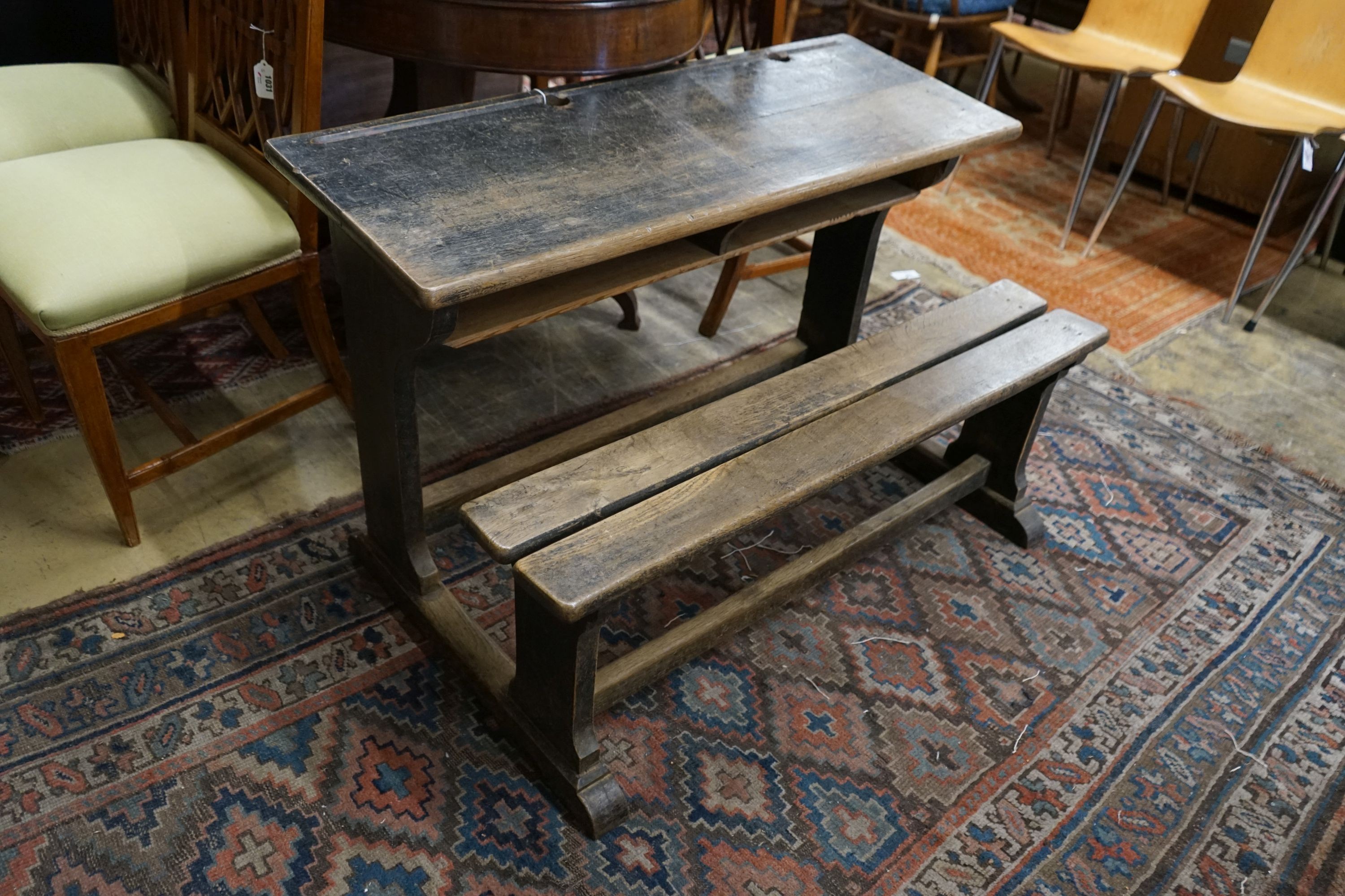 A vintage oak double student's desk, width 105cm, depth 65cm, height 67cm